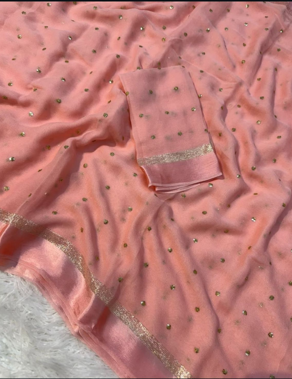 premium viscose georgette with Sequins butti work